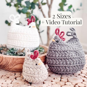 Three crochet chickens in white, oatmeal, and gray sitting on wood slices, with text noting two sizes and a video