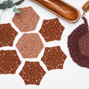 A handmade crocheted bag with eucalyptus leaves, perfect as a unique and vintage-inspired accessory.