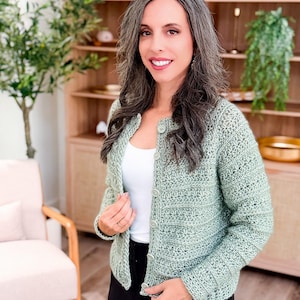 May include: A set of three ceramic mugs with a speckled, matte finish. The mugs are in shades of cream, light gray, and dark gray. Each mug has a simple, minimalist design and a rounded handle.