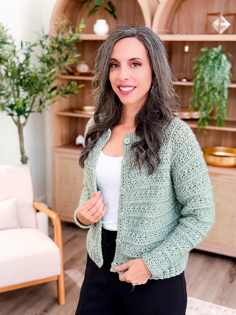 May include: A set of three ceramic mugs with a speckled, matte finish. The mugs are in shades of cream, light gray, and dark gray. Each mug has a simple, minimalist design and a rounded handle.