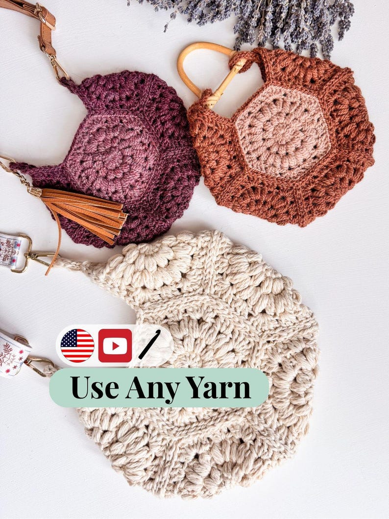 May include: Three handmade crochet bags in shades of purple, brown, and cream. The purple bag has a leather tassel and strap. The brown bag has a wooden handle. The cream bag has the text "Use Any Yarn" on it.