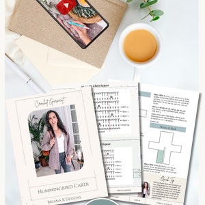 May include: A flat lay featuring a smartphone displaying a crochet tutorial, a cup of tea, and printed crochet patterns. The patterns include diagrams and the text "Crochet Garment" and "Hummingbird Cardi". A PDF file icon is also visible.