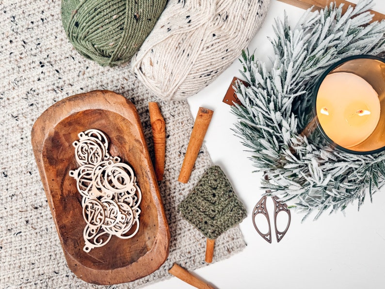 May include: A set of three ceramic mugs with a speckled, matte finish. The mugs are in shades of cream, light gray, and dark gray. Each mug has a simple, minimalist design, perfect for coffee or tea.