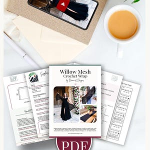 May include: A digital PDF pattern for a Willow Mesh Crochet Wrap by Briana K Designs. The document includes written instructions, yarn requirements, and photographs of a black crochet wrap worn by a person and displayed on a table.