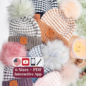May include: A collection of seven crocheted beanies in various colors including pink, grey, white, brown, and black, each topped with a faux fur pom-pom and featuring a square brown leather tag with a logo. Text reads 6 Sizes + PDF Interactive App.