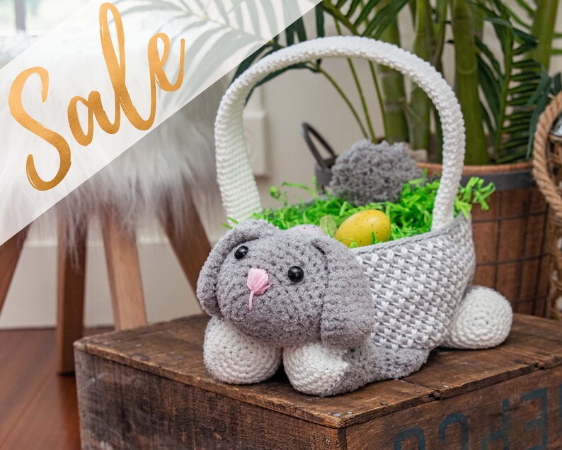 A bunny crochet easter basket with a handle in bright colors.