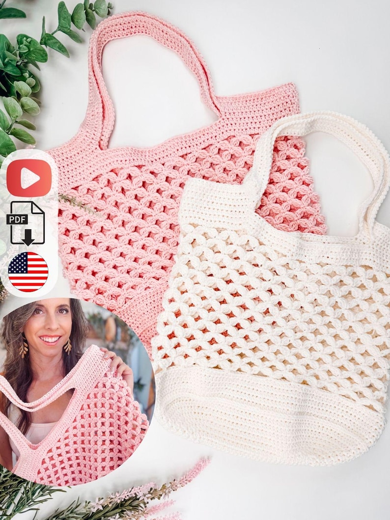 May include: Two handmade crochet tote bags. One is light pink, the other is off-white. Both bags have a mesh-like pattern and sturdy handles. The bags are displayed on a white surface with greenery.