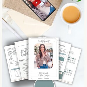 May include: A digital PDF crochet pattern for a Circle Leaf V-Neck Cardigan by Briana K Designs, featuring instructional pages with diagrams, measurement guides, and a progress tracker, displayed alongside a smartphone showing a video tutorial.