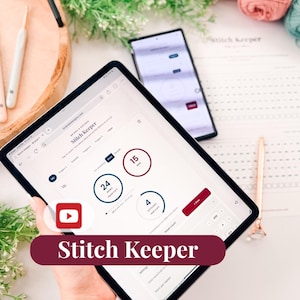 May include: A tablet displaying the Stitch Keeper digital interface with circular counters for rows and stitches, alongside a smartphone, a pen, and yarn balls. The screen shows numerical data including 24, 15, and 4, with a red YouTube icon overlay.