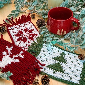May include: Three crocheted coasters with festive winter designs. The coasters are red, green, and white with snowflake, reindeer, and Christmas tree patterns.