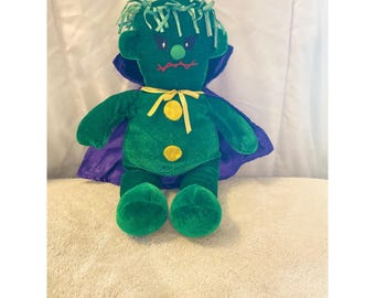 Peluche vintage Kuddle Me Toys Mostro di Frankenstein con mantello verde e viola per Halloween