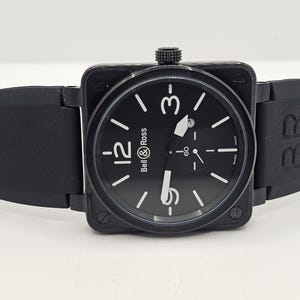 Reloj de pulsera vintage Bell&Ross BR para hombre, movimiento de cuarzo, esfera negra, indicador de fecha, bisel giratorio. Envío gratis. imagen 1