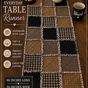 May include: A rectangular table runner measuring 50 inches long and 20 inches wide, constructed from a patchwork of quilted fabric squares in solid black, tan, and black-and-tan gingham check patterns with frayed, exposed seams between each square.