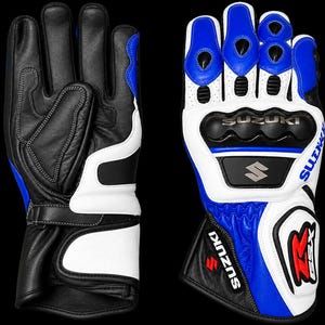 May include: A pair of motorcycle gloves in black, white, and blue leather. The palm side features reinforced black leather padding. The back side displays the Suzuki logo, the text Suzuki, and the GSX emblem with red and black lettering.