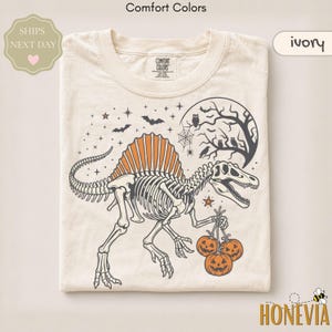 Halloween Dinosaur Shirt Spooky Dino Skeleton Shirt Retro Halloween Shirt Spooky Dinosaur Graphic Tee Comfort Colors Fall Outfit Autumn Tee