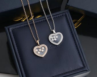 Halskette aus 18-karätigem Roségold, vergoldet, mit Herzanhänger aus Zirkonia-Pavé und fünf Perlen.