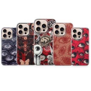 May include: Five smartphone cases arranged in a row, each featuring distinct graphic designs. The patterns include black and white eyes, dark abstract motifs, a large central eye, red line-art eyes, and a dense red background with multiple eyes.
