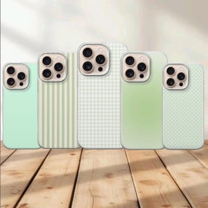 May include: Five smartphone cases arranged in a row, each featuring a triple-lens camera cutout. The designs include a solid light green, vertical stripes, a white and green gingham check, a light green gradient, and a white polka dot pattern.