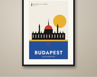 May include: A framed poster titled Bauhaus City Series No. 04 Budapest Magyarország. The graphic features a black silhouette of the Hungarian Parliament building, a yellow sun, and a blue base with white text on a cream background.