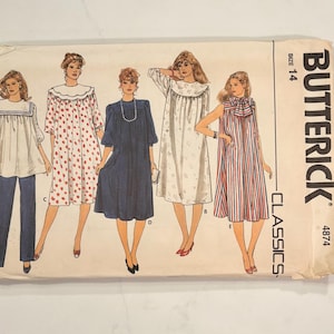 May include: A Butterick Classics sewing pattern envelope, size 14, number 4874. The front displays five illustrations of garments: a sailor-style top with pants, a floral dress with a wide collar, a solid navy dress, a floral dress, and a striped dress.