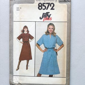 May include: A vintage Simplicity sewing pattern, number 8572, for dresses. The envelope is off-white and includes the text "Simplicity" and "Jiffy plus". The size is 12 Miss.