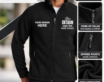 May include: A black fleece jacket featuring a full-length front zipper, a stand-up collar, and two zippered side pockets. The chest area displays the text YOUR DESIGN HERE and YOUR DESIGN Logos Texts stitching embroidery in white thread.