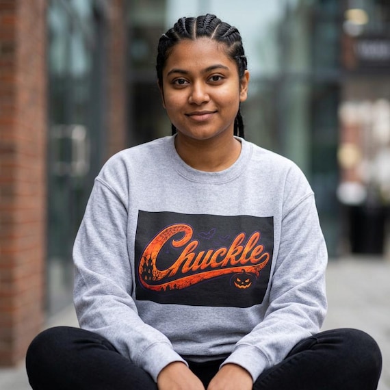 Pumpkin Sweatshirt, Chuckle Graphic with Orange Print and Sleeve Typography