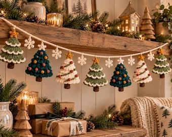 May include: A crochet garland featuring alternating green and white Christmas tree ornaments with brown trunks and yellow star toppers, interspersed with small white crocheted snowflakes, all suspended from a thick white yarn string.