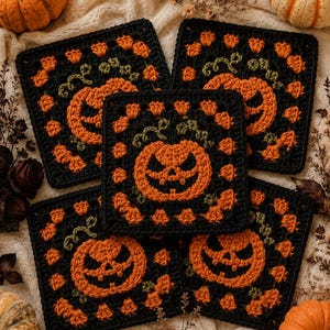 May include: Five square crochet motifs featuring a central orange jack-o'-lantern with a carved face and green vines, surrounded by a black border with small orange accents. The design is repeated across all five pieces, showcasing detailed yarn work.