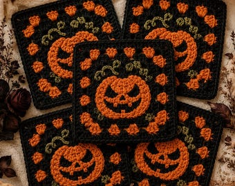 May include: Five square crochet motifs featuring a central orange jack-o'-lantern with a carved face and green vines, surrounded by a black border with small orange accents. The design is repeated across all five pieces, showcasing detailed yarn work.