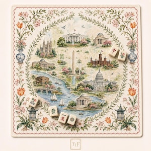 May include: A square mat featuring a watercolor illustration of Washington D.C. landmarks, including the White House and Capitol, framed by floral vines and blue vases. Five mahjong tiles with Chinese characters and symbols are placed on the surface.