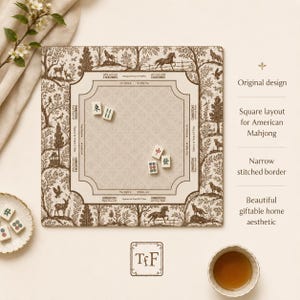 May include: A square American Mahjong mat featuring a brown and cream toile-style print of forest animals and trees. The center play area includes printed instructions for the Charleston, with four Mahjong tiles placed on the surface.