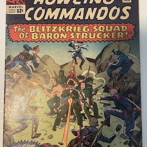 Op de afbeelding: Een vintage Marvel-stripboek getiteld Sgt. Fury and His Howling Commandos nummer 14, gedateerd januari. De cover bevat een kleurrijke actie-illustratie van soldaten in gevecht met de tekst The Blitzkrieg Squad of Baron Strucker.