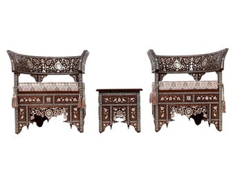 Syrian Mother-of-Pearl Inlaid Three-Piece Salon Set: Pair of Crested Armchairs with Side Table, one of a kind