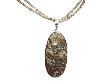 Large Ammonite set in Sterling Silver Frame,  Supported by a Smokey Quartz Necklace