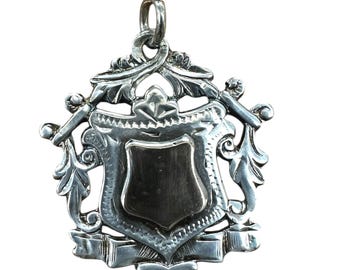 Sterling Silver Hallmarked Pendant featuring Gold Tone Shield - Unique Charm Medal