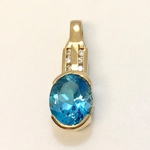 14K Yellow Gold Blue Topaz Pendant with Diamond Accents