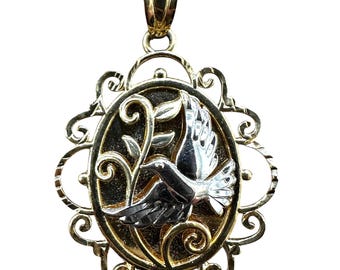 Vintage 10 Karat Yellow and White Gold Pendant with a Dimensional Design Flying Bird