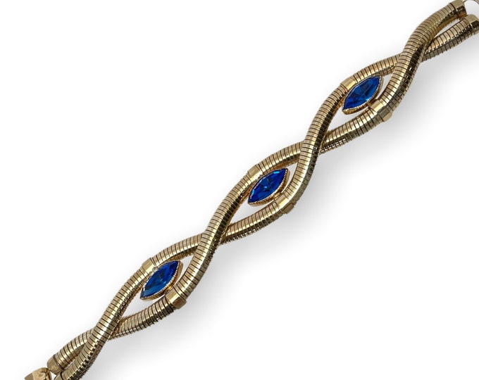 Vintage Glamour: Blue Rhinestone Bracelet with 10K Yellow Gold Filled Design