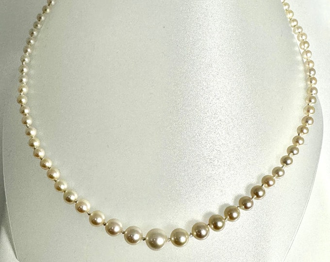 Vintage Graduated Cultured Pearl Necklace with 14 Karat White Gold Filigree Clasp Accented with Two Round Diamonds