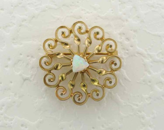 Sunburst Pin/Pendant Set with a Cabochon Cut Triangle Shaped Opal Set in 14 Karat Yellow Gold