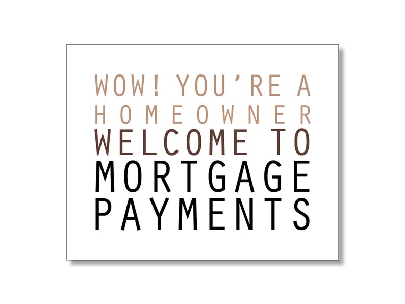 May include: A white card with the text "WOW! YOU'RE A HOMEOWNER WELCOME TO MORTGAGE PAYMENTS" in black and brown text.