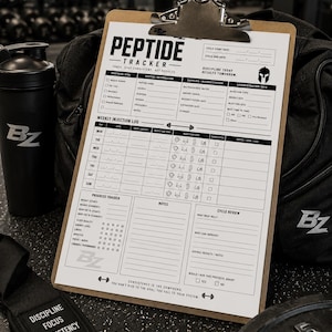 May include: A clipboard with a "Peptide Tracker" form, a black water bottle, and a gym bag. The form includes sections for protocol goals, weekly injection logs, and a progress tracker. The text "Discipline Focus Consistency Results" is on a black wrist strap.