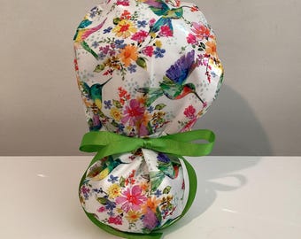 Floral print and hummingbird scrub cap