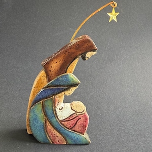 Nativity stoneware family Mary, Joseph, and Jesus. 3.25 inches w/o star.  Christmas.