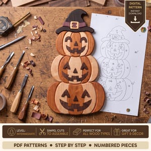 May include: A wooden intarsia wall hanging featuring three stacked jack-o'-lanterns wearing a witch hat, displayed next to a printed paper pattern with numbered pieces. The pumpkins are crafted from various wood tones with dark brown facial features.