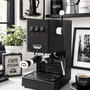 May include: A matte black Gaggia espresso machine featuring a vertical lever with a white ball top, three rectangular power switches, a chrome portafilter with a black and white handle, and a metal drip tray. The front displays the Gaggia logo.