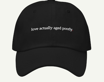 love actually aged poorly. - funny christmas dad hat