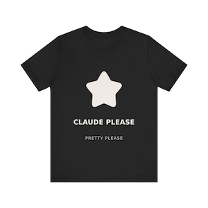 以下が含まれることがあります： クリーム色の星のグラフィックが特徴の黒いTシャツ。「CLAUDE PLEASE」の文字が星の下に配置され、その下に「PRETTY PLEASE」と書かれています。カジュアルな普段着のTシャツ。