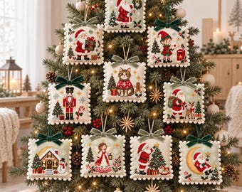 May include: A collection of ten square, cross-stitched Christmas ornaments hanging on a pine tree. Each ornament features a unique holiday design, including Santa Claus, an elf, a nutcracker, a cat, an angel, and a gingerbread house, all finished with a velvet ribbon.